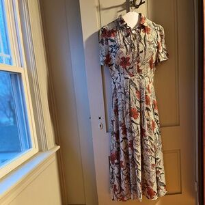 Floral dress with tie around neck option (runs smaller)